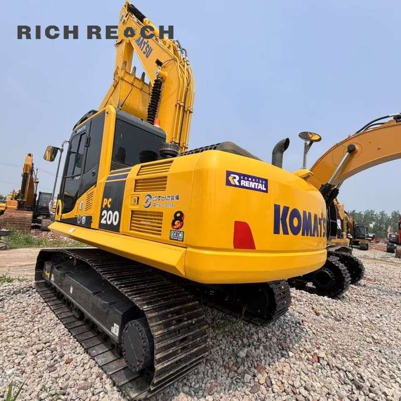 Rear view of a 2018 Komatsu PC200 excavator listed for $25,000